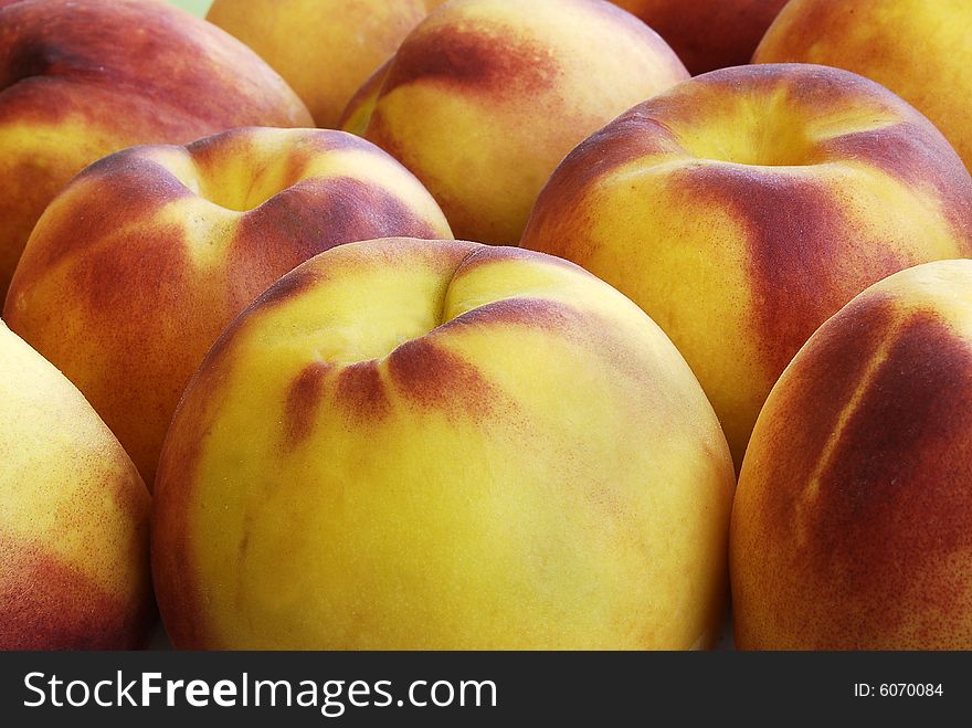 Close up of yellow peaches