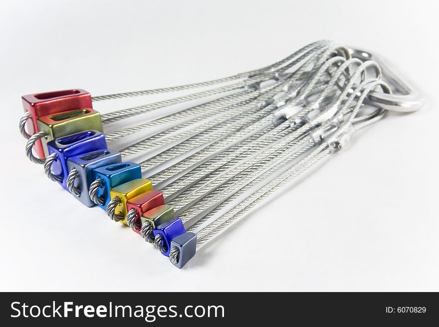 Rock climbing gear isolated against a white background. Rock climbing gear isolated against a white background