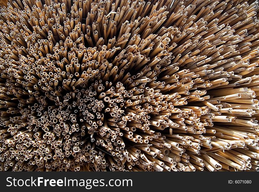 Straw background. Element of an old building roof