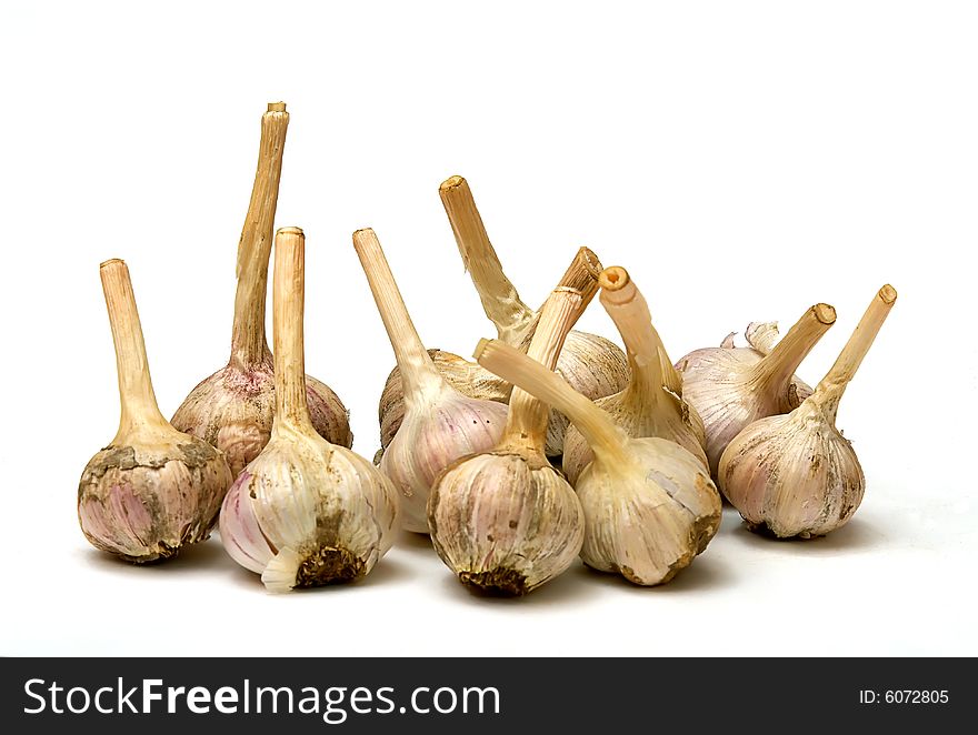 Garlic bulbs closeup isolated on white