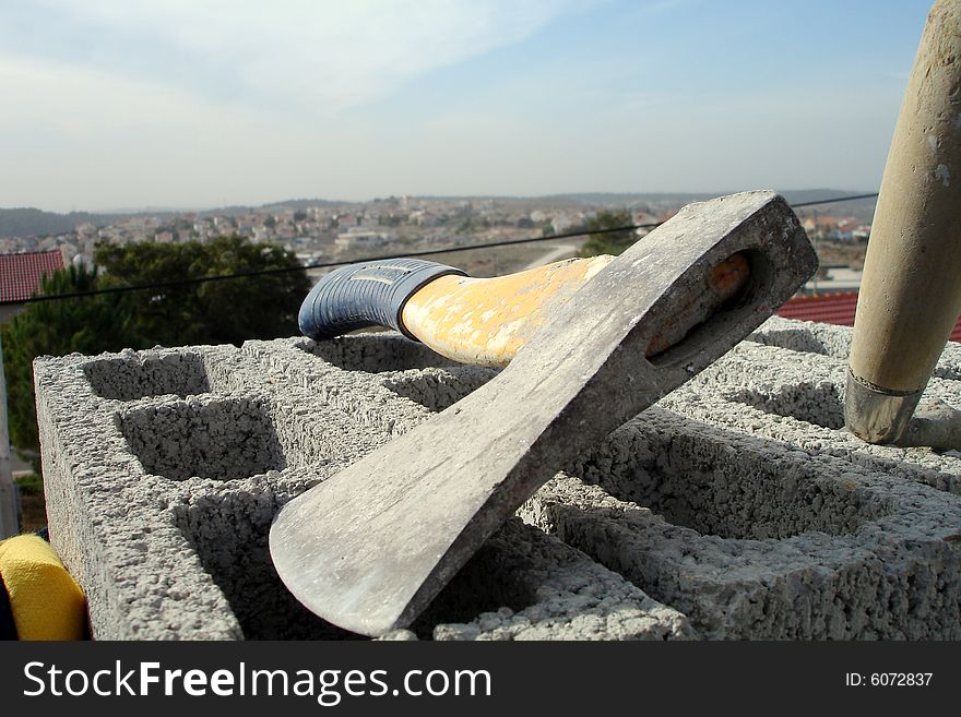 Hand Axe Resting on Cinder Block