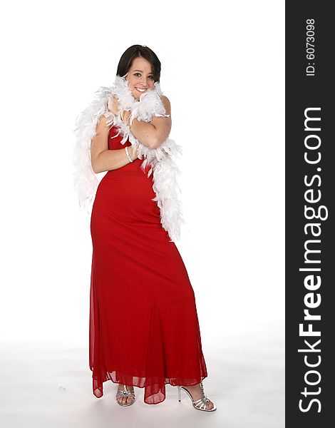 Cute teen with white boa and red gown