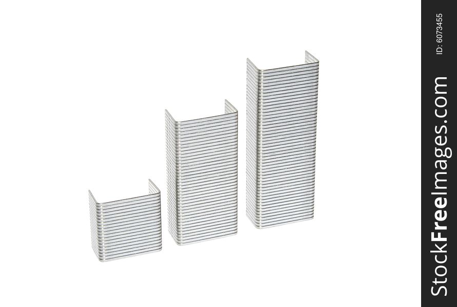 Three paper-clips standing abreast on white background. Three paper-clips standing abreast on white background