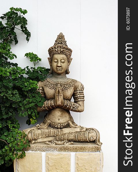 Traditional stone carved Thai statue - travel and tourism.