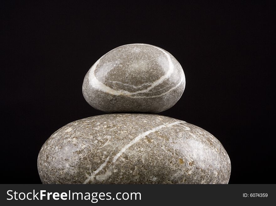 Zen stones on the black background