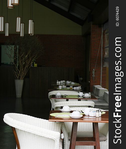 Tables and chairs in a modern restaurant.