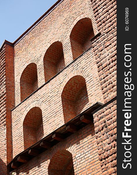 Old Arsenal brick wall. Arsenal was built in 1576 as a part of old medieval city fort. Bright and sunny summer day in Lviv, Ukraine, August 2008. Camera: Canon EOS5D with 70-200/4L IS lens. DPP processed RAW file. Old Arsenal brick wall. Arsenal was built in 1576 as a part of old medieval city fort. Bright and sunny summer day in Lviv, Ukraine, August 2008. Camera: Canon EOS5D with 70-200/4L IS lens. DPP processed RAW file.