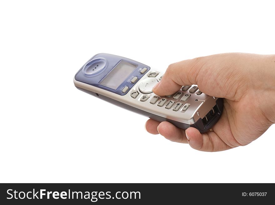 Telephone in hand on white background