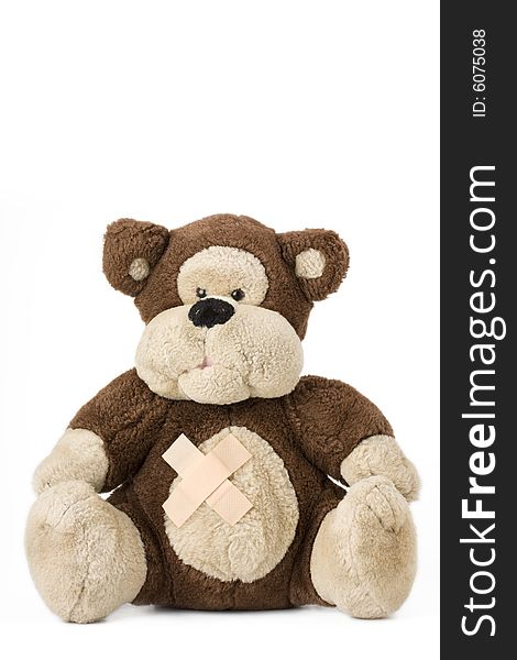 Teddy bear with bandaids