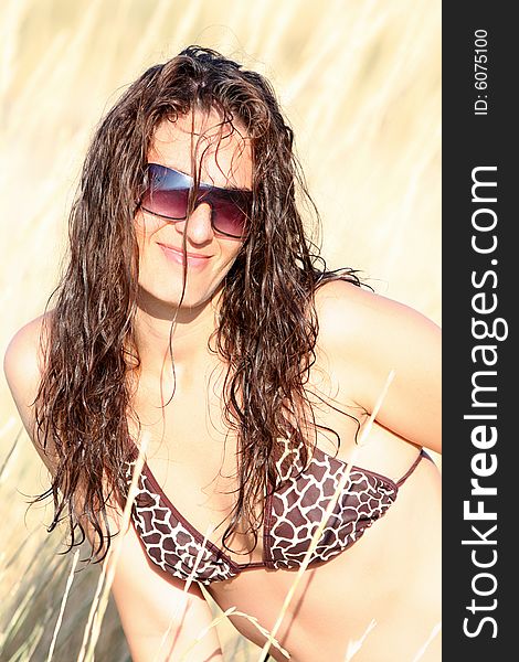 Young woman near of beach in the sea