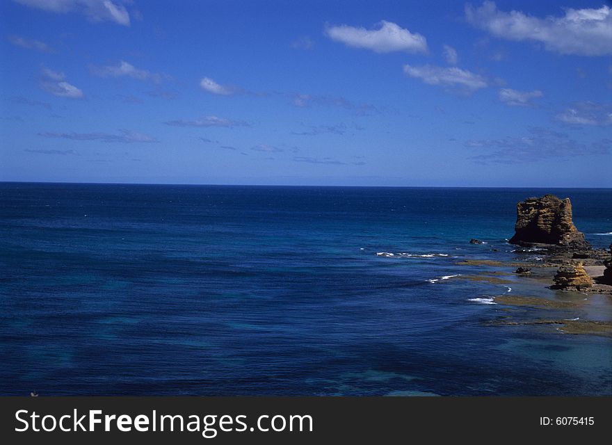 In the Great ocean road of Australia,the sea is really navy blue like a large diamond. In the Great ocean road of Australia,the sea is really navy blue like a large diamond.