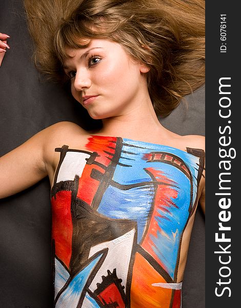 Portrait of young slim women with body art