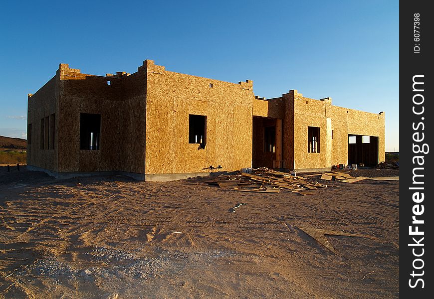 Construction site with an unfinished frame of a building. Horizontally framed photo. Construction site with an unfinished frame of a building. Horizontally framed photo.