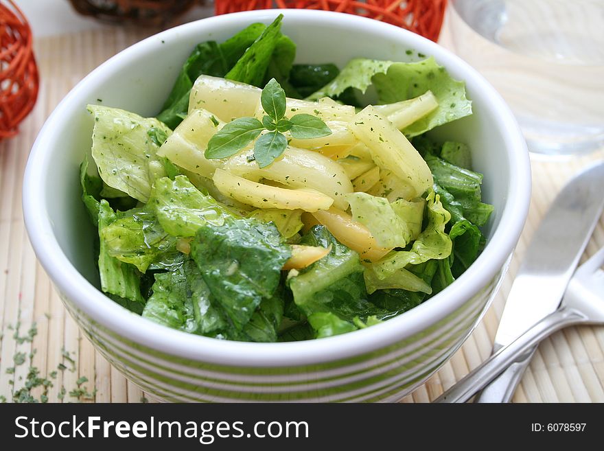 A meal of fresh salad with some paprikas