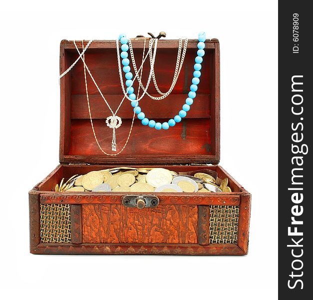 Old wooden trunk with money and jewellery isolated