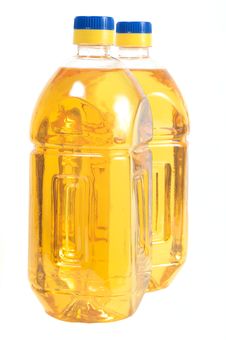 Two Bottles Filled With Oil Stock Images