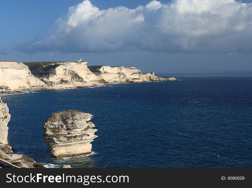 Le grain de sable is a rock in the Mediterranean at feet of Bonifacio's cliff, Corsica, France