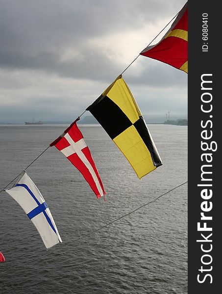 Colourful flags on a ferry boat on the Saint Lawrence River