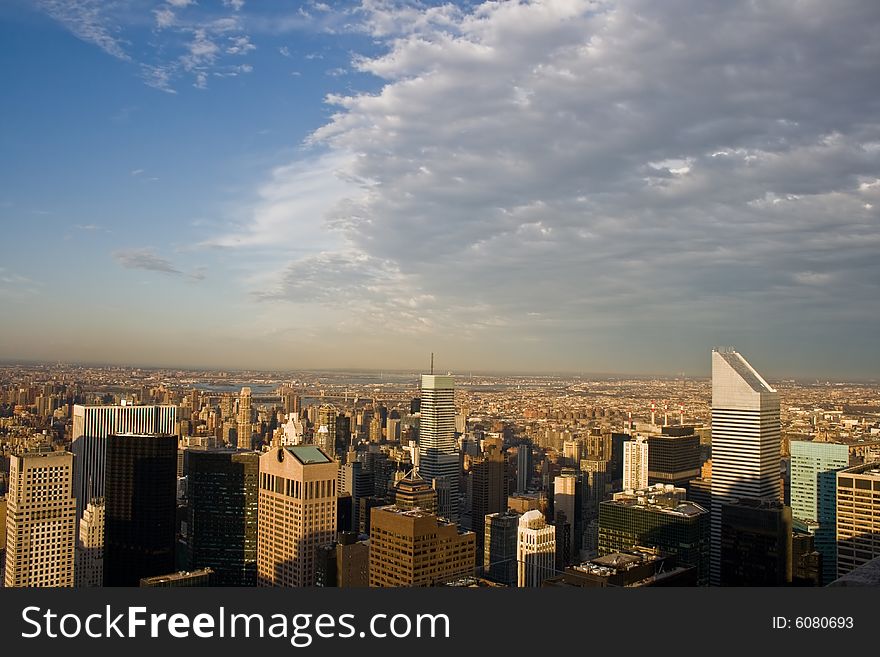 View of uptown Manhattan and Central Park, from atop a skyscraper, New York City. View of uptown Manhattan and Central Park, from atop a skyscraper, New York City.