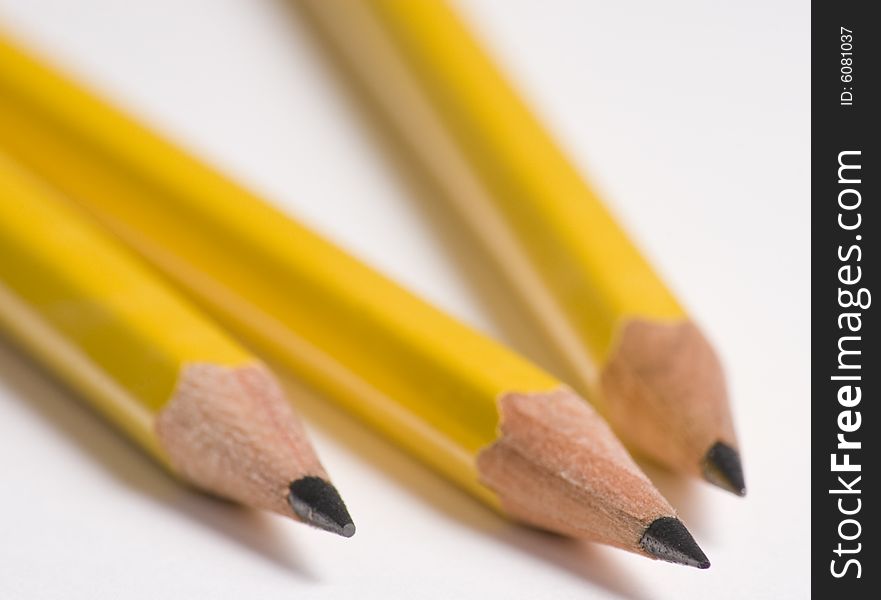 Three Pencils Close Up on White