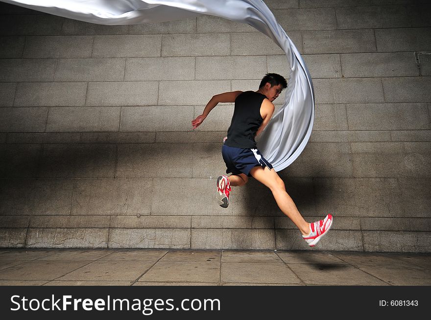 Pictures of people swirling fabric in motion. Pictures of people swirling fabric in motion.