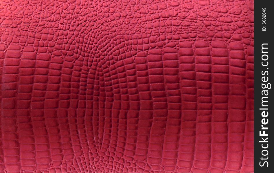 Red reptile leather imitation texture. Red reptile leather imitation texture
