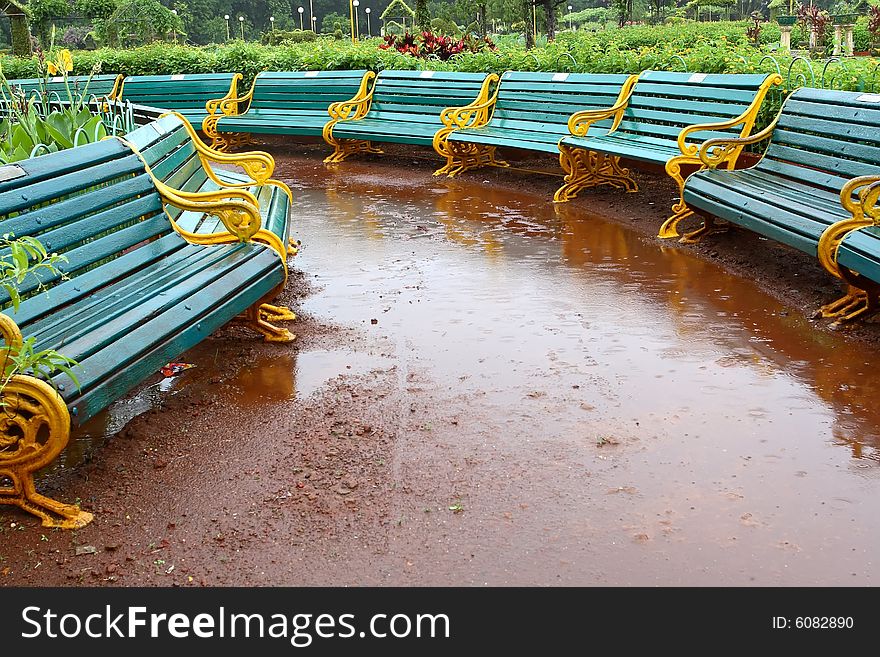 Wooden bench in garden, India