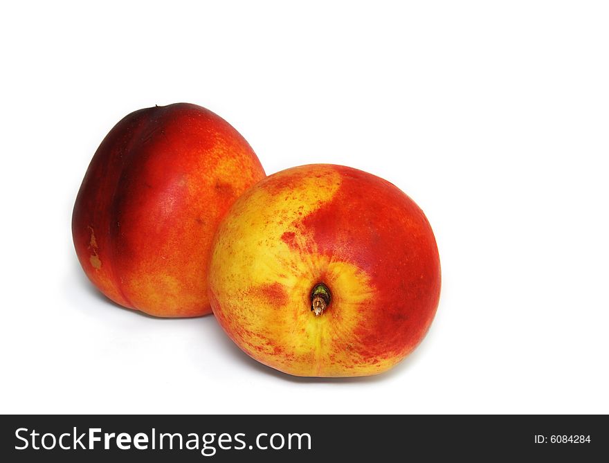 Two red-yellow peaches, isolated on a white background. Two red-yellow peaches, isolated on a white background.