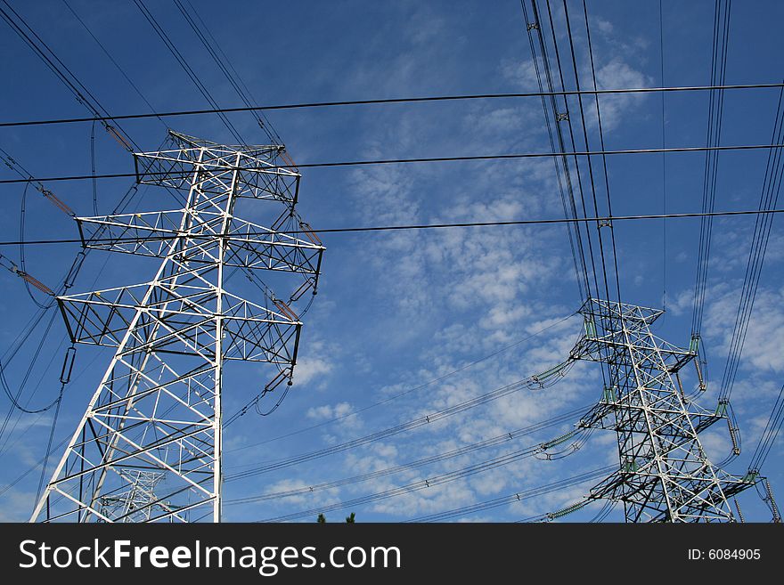 Electricity power pylon stretches into the sky