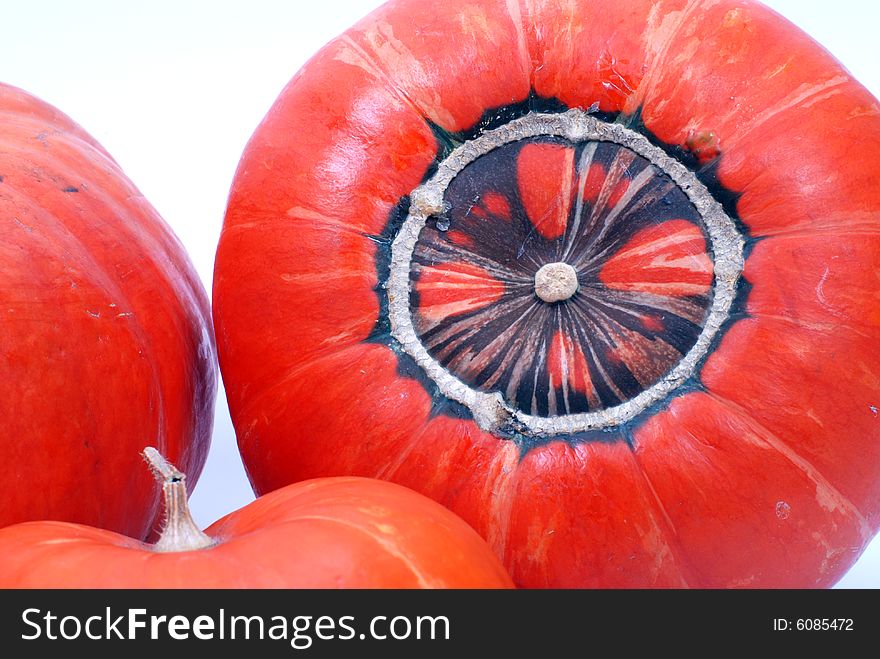 Three pumpkins on white background.