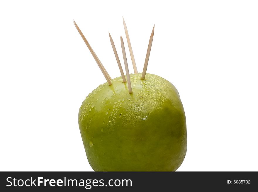 Prickly green apple with spikes going from within