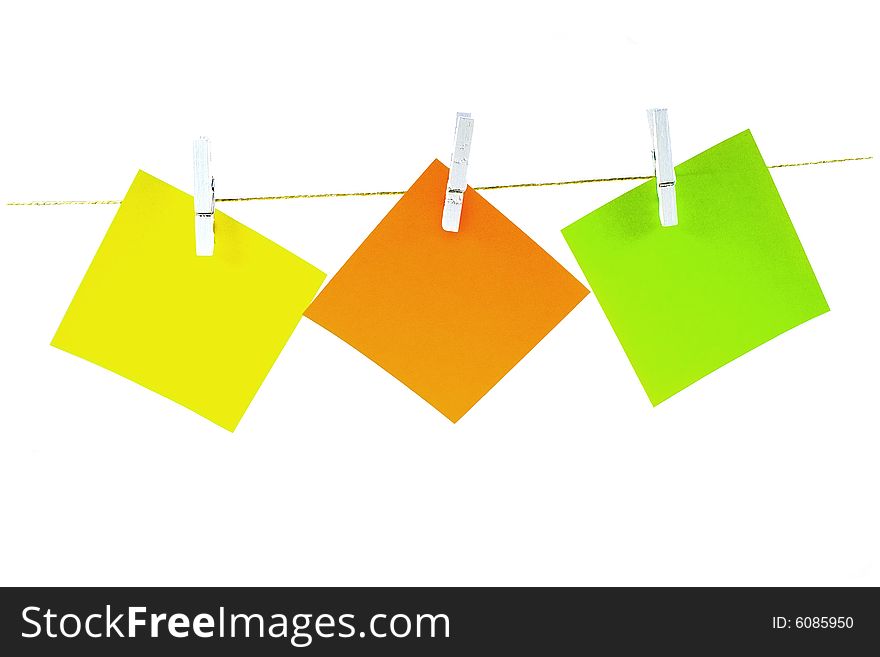 Colored notepaper on white background