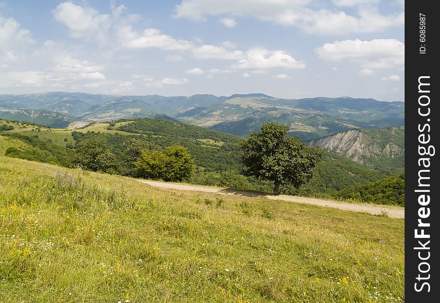 Beauty mountains view in georgia. Blue sky sunny summer day.