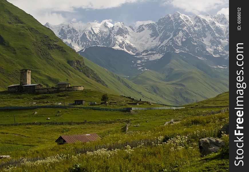 Ushguli beauty small village in georgia. Big mountains green grass. Beauty place.