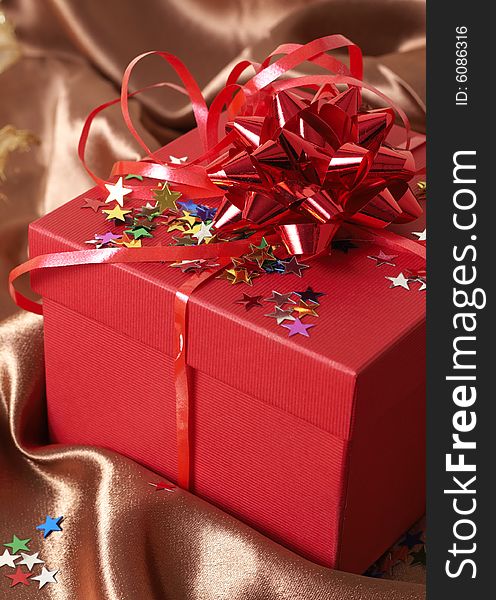 Red Gift Box With Bows And Stars