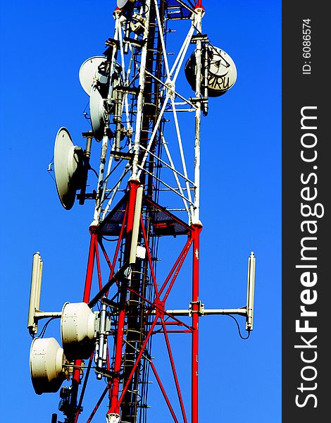 Image of telecomunication tower on the blue sky