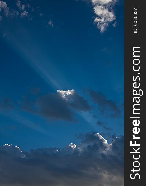 Shafts of light caused by sun and clouds