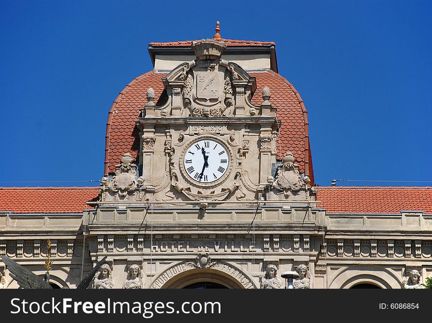 Exterior of old building with clock tower. Exterior of old building with clock tower.