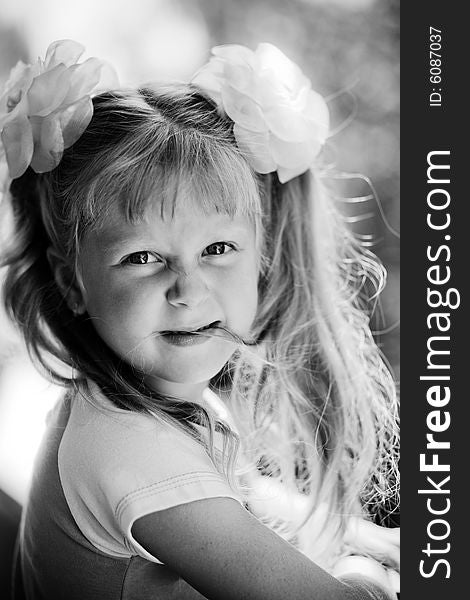 Black and white portrait of cute girl. Outdoor. Black and white portrait of cute girl. Outdoor.