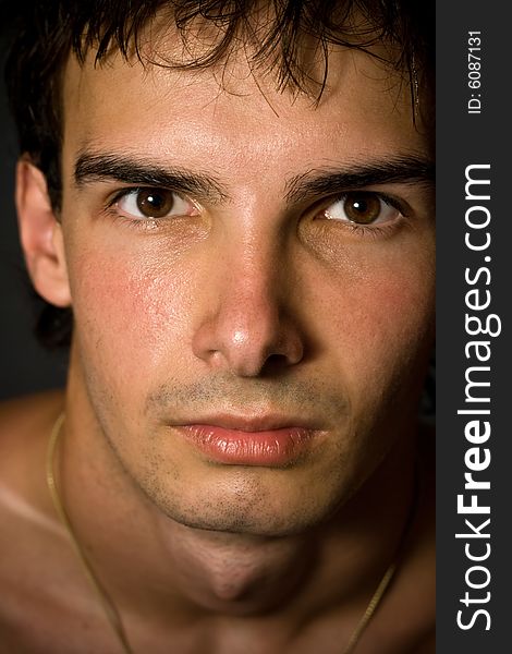 Close-up portrait of masculine young man. Close-up portrait of masculine young man