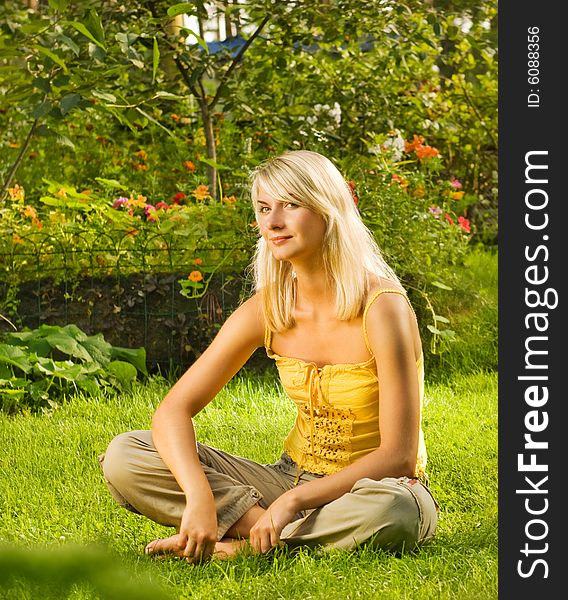 Beautiful young woman relaxing outdoors