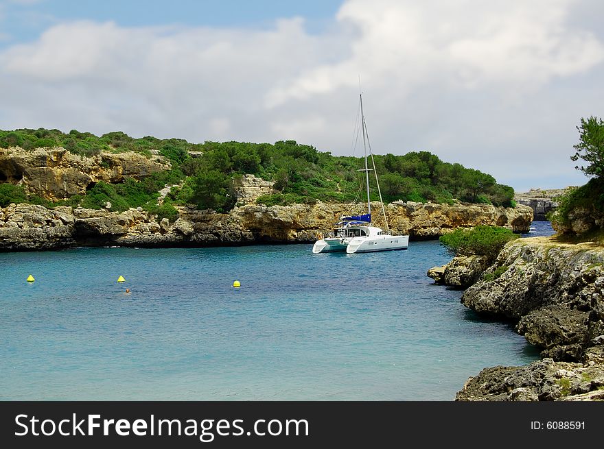 Marine landscape with yacht in coastal waters. Marine landscape with yacht in coastal waters