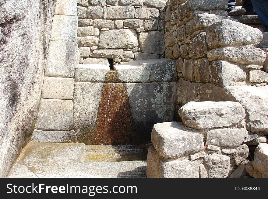 These fountains or bathing spots are located all throughout the ruins of machu-picchu peru. each stone had to be channeled to fit so the water could flow to and from. These fountains or bathing spots are located all throughout the ruins of machu-picchu peru. each stone had to be channeled to fit so the water could flow to and from