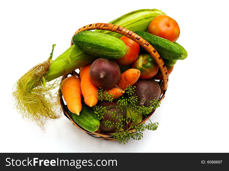 An image of  fresh vegetables in wooden backet. An image of  fresh vegetables in wooden backet