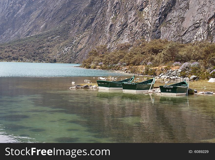 Boats at mountain lake