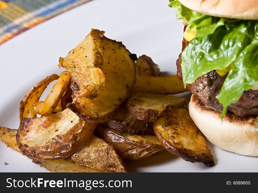 Nice big juicy hamburger on a white plate. Nice big juicy hamburger on a white plate