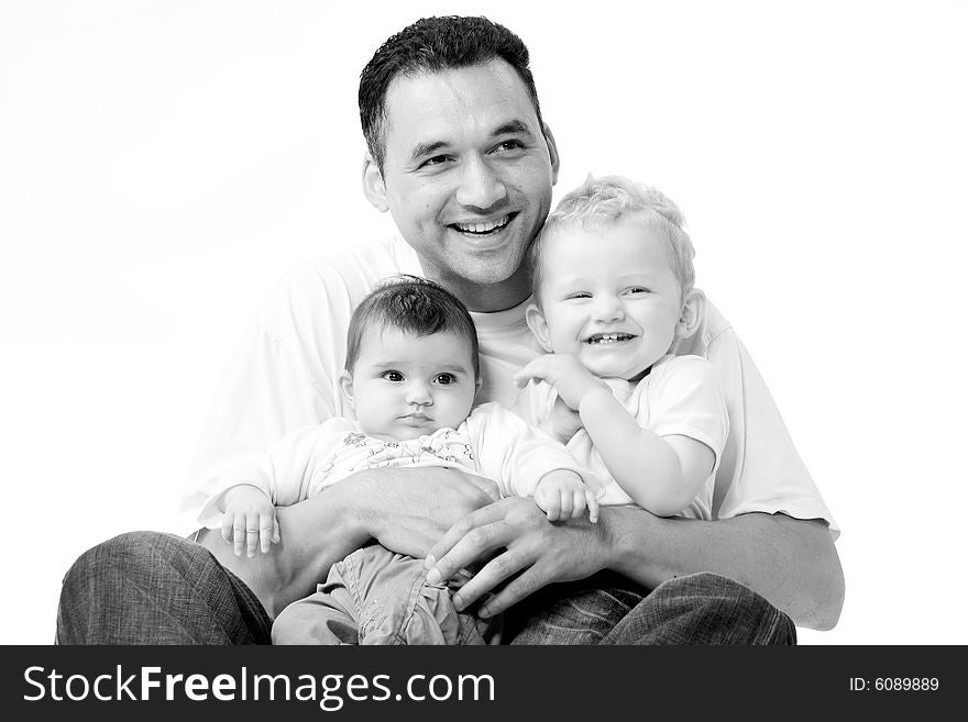 Cute brother and sister from different races having fun with daddy. Cute brother and sister from different races having fun with daddy