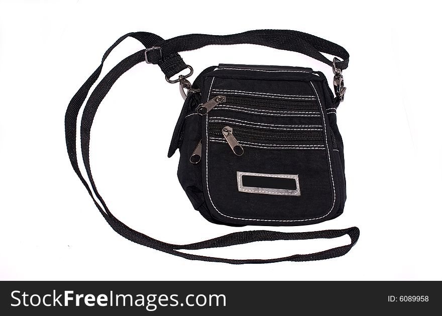 Black bag with a belt and locks on a white background