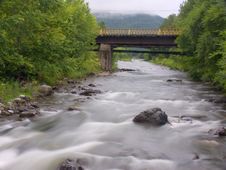 The Old Bridge Through The River Royalty Free Stock Photography The Old Bridge Through The River Royalty Free Stock Photography