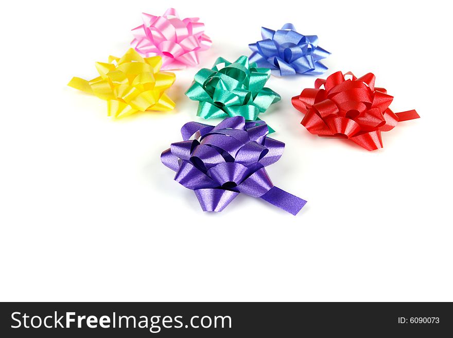 Multicolored bows isolated on white